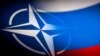NATO and Russian flags are seen printed on paper in this illustration taken January 27, 2022. 