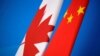 中国国旗与加拿大国旗（路透社资料图）