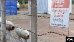 FILE PHOTO - Warning signs are seen at the Cambodian Mine Action Center in Kampong Chhnang province, Cambodia, March 31, 2017. (Sun Narin/VOA Khmer)