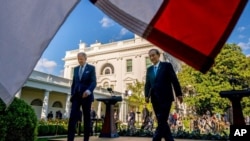El presidente Joe Biden y el primer ministro japonés Yoshihide Suga tras una conferencia de prensa en la Casa Blanca en Washington, el 16 de abril 2021.