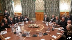 Libya Chief of Staff, Marshall Khalifa Haftar, President of the Libyan House of Representatives in Tobruk Aguila Saleh Issa, Chairman of the Presidential Council of Libya, Fayez al-Sarraj, and Khaled Mechri attend a conference on Libya.