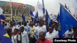 Protesters begin to assemble near parliament in Kinshasa, DRC.