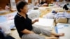 After Floods, Japan Suffers in Heat Without Water