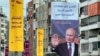 Реклама майбутніх виборів президента Росії із зображенням президента Росії Володимира Путіна на будівлі у Бейруті, Ліван, 9 березня, 2024р. Надпис на білборді: "Зазіхання на релігійні переконання інших не є свободою вираження поглядів". AP Photo/Hussein Malla