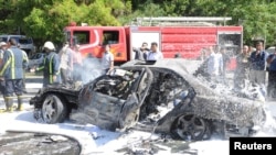 Damashqda bomba xurujiga uchragan avtomobil, 29-aprel, 2013-yil.