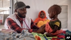 FILE - A Sudanese child suffering from malnutrition is treated at an MSF clinic in Metche Camp, Chad, near the Sudanese border, on April 6, 2024. The U.N. food agency warned of "imminent risk of famine" in Sudan.