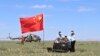 Historic Chinese lunar probe returns to Earth