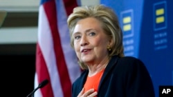 FILE - Democratic presidential candidate Hillary Rodham Clinton gestures as she speaks at Human Rights Campaign gathering in Washington.