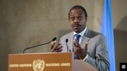 L'ancien ministre de la Santé de la RDC, Oly Ilunga, intervient, le 15 juillet 2019 à Genève. (Photo FABRICE COFFRINI / AFP)