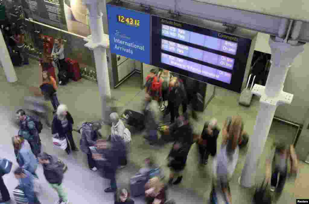Britain said it would start screening passengers entering the country through London's two main airports and the Eurostar rail in an effort to curtail the spread of Ebola, Oct. 10, 2014.