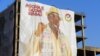 Um cartaz do candidato presidencial Domingos Simões Pereira num prédio da Guiné-Bissau. 21 Novembro 2019