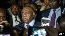 L’opposant congolais Jean-Pierre Bemba devant la presse après s’être porté candidat à la présidentielle du 23 décembre au bureau de la Commission électorale, à Kinshasa, le 2 août 2018.