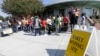 FILE - Voters line up during early voting at Chavis Community Center in Raleigh, N.C., Oct. 20, 2016. Voters in the key presidential battleground of North Carolina demonstrated keen interest on the first day of early voting, as some waited in line for more than an hour Thursday to cast ballots. 