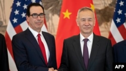 资料照：中国副总理刘鹤和美国财政部长姆努钦在北京钓鱼台国宾馆会晤。（2019年3月29日）