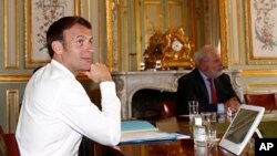 French President Emmanuel Macron during a videoconference on the conoravirus with Group of Seven leaders at the Elysee Palace in Paris, Thursday, April 16, 2020.