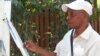 Artista angolano ganha vida desenhando retratos pelas ruas de Luanda