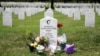 The grave of Army Captain Humayun Khan is seen adorned with flowers at Arlington National Cemetery in Arlington, Virginia, Aug. 1, 2016. 