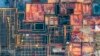 FILE - This aerial photo taken on Oct. 26, 2023, shows workers at a construction site in Huaian, in China's eastern Jiangsu province. Jiangsu authorities are encouraging workers at state-owned enterprises to take leave without pay to start their own businesses.