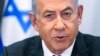 ARCHIVO - El primer ministro israelí, Benjamin Netanyahu, preside una reunión de gabinete en la base militar de Kirya en Tel Aviv, Israel, el 24 de diciembre de 2023. 