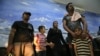Asylum seekers rescued from heavy seas off Java, wait inside a temporary detention room upon arrival at a local marine police station in Surabaya, East Java, Indonesia, July 29, 2012.