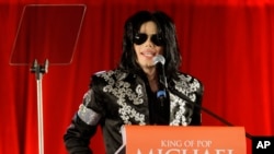 FILE - In this March 5, 2009 file photo, US singer Michael Jackson announces that he is set to play ten live concerts at the London O2 Arena in July, which he announced at a press conference at the London O2 Arena. Jackson and Sony Corp. announced March 14, 2016, that the singer's estate had sold its half interest in the massive Sony/ATV Music Publishing catalog to the company for $750 million.
