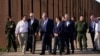 Presiden Joe Biden berbicara dengan anggota parlemen AS, Henry Cuellar (kedua dari kiri), saat mereka berjalan di sepanjang perbatasan AS-Meksiko di El Paso Texas, Minggu, 8 Januari 2023. (AP/Andrew Harnik)