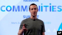 FILE - Facebook CEO Mark Zuckerberg speaks in preparation for the Facebook Communities Summit, in Chicago, Illinois, June 21, 2017. 