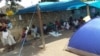 Some of the women and children camping at the GMB headquarters in Harare. (Photo: Patricia Mudadigwa)
