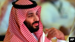 FILE - Saudi Crown Prince, Mohammed bin Salman attends the second day of the Future Investment Initiative conference, in Riyadh, Saudi Arabia, Oct. 24, 2018. 