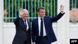 Президент Франції Еммануель Макрон і канцлер Німеччини Олаф Шольц у Мезебергу поблизу Берліна, східна Німеччина, 28 травня 2024 року. (Фото^ Odd ANDERSEN / AFP)