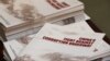 FILE - Copies of a booklet from the Central Commission for Discipline Inspection, the ruling Communist Party's anti-graft watchdog, at a news conference in Beijing, January 15, 2016.