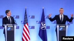 U.S. Secretary of State Antony Blinken and NATO Secretary General Jens Stoltenberg attend a news conference at a NATO Foreign Ministers' meeting at the Alliance's headquarters in Brussels, Belgium March 23, 2021. REUTERS/Yves Herman/Pool