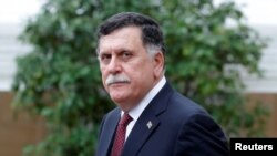 Le Premier ministre libyen Fayez al-Sarraj en marge d'une conférence internationale sur la Libye à l'Elysée à Paris, le 29 mai 2018.
