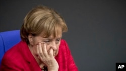German Chancellor Angela Merkel attends a plenary session of German parliament Bundestag in Berlin, Nov. 21, 2017. 