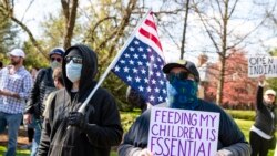 Manifestantes en Indiana piden regresar a sus trabajos.