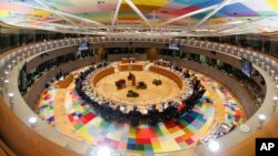 European Union heads of state participate in a round table meeting at the EU summit in Brussels, Dec. 14, 2017. 