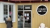 Customers line up in front of Halifax cafe Coburg Social, which has maintained a take-out window throughout the pandemic. (Jay Heisler/VOA)