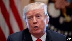 Le président Donald Trump en réunion avec des dirigeants de l'acier et de l'aluminium à la Maison Blanche, le 1er mars 2018