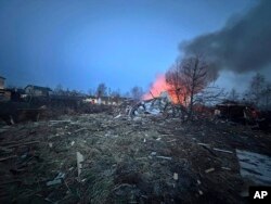 Moskova Bölge Valisi Andrey Vorobyev'in resmi telgraf kanalı tarafından yayınlanan bu fotoğraf, Rusya'nın başkenti Moskova'nın dışında düşürülen bir İHA görünüyor -11 Mart 2025.