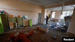 Последствия падения обломков российского дрона на детский сад в Соломенском районе Киева.