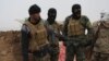 Iraqi Shia Militiamen Win Trust in Some Sunni Villages, Face Tougher Tests Ahead