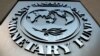 FILE PHOTO: The IMF logo is seen outside the headquarters building in Washington