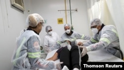Brote de la enfermedad por coronavirus (COVID-19) en Brasil. Fotografía del el 24 de marzo de 2021