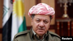FILE - Kurdish Regional Government President Massoud Barzani conducts an interview in Irbil, Iraq.
