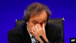Michel Platini, le 24 mai 2013 à Londres. (AP Photo/Sang Tan, file)