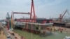 Upacara peluncuran Fujian, kapal induk ketiga China di Shanghai, Jumat, 17 Juni 2022. (Li Gang/Xinhua via AP)