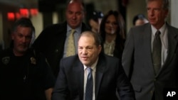 Harvey Weinstein arrives at a Manhattan courthouse for jury deliberations in his rape trial, Feb. 24, 2020, in New York.