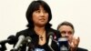 FILE - Chai Ling, a former student leader during the Tiananmen Square protests, speaks as U.S. Representative Chris Smith (R-NJ) stands behind her during a news conference on Capitol Hill in Washington, January 18, 2011.