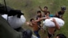 Relief Coming to Outlying Typhoon Survivors in Philippines 