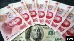 Beijing menghadapi tekanan untuk membiarkan nilai mata uang Tiongkok naik terhadap dolar.